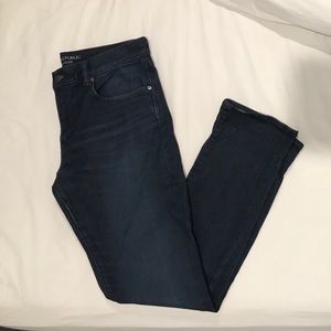 The traveler dark wash jeans